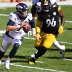PITTSBURGH, PA - SEPTEMBER 20:  Jeff Driskel #9 of the Denver Broncos looks to pass in front of Isaiah Buggs #96 of the Pittsburgh Steelers during the third quarter at Heinz Field on September 20, 2020 in Pittsburgh, Pennsylvania. (Photo by Joe Sargent/Getty Images)