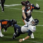 Ryan Tannehill (17) of the Tennessee Titans narrowly avoids a sack by Jeremiah Attaochu (97) and Bradley Chubb (55) of the Denver Broncos during the first quarter on Monday, September 14, 2020. (Photo by AAron Ontiveroz/MediaNews Group/The Denver Post via Getty Images)
