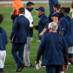 Head coach Mike Vrabel of the Tennessee Titans and head coach Vic Fangio of the Denver Broncos shake hands after a 16-14 Titans win at Empower Field at Mile High on September 14, 2020 in Denver, Colorado. (Photo by Dustin Bradford/Getty Images)