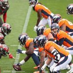 DENVER, COLORADO - SEPTEMBER 27: Quarterback Jeff Driskel #9 of the Denver Broncos stands behind center against the Tampa Bay Buccaneers during the first half at Empower Field At Mile High on September 27, 2020 in Denver, Colorado. (Photo by Matthew Stockman/Getty Images)
