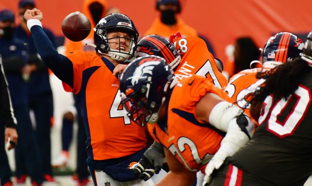 Denver Broncos QB Brett Rypie (4) fumbles in the 4th quarter of the game against Tampa Bay Buccanee...