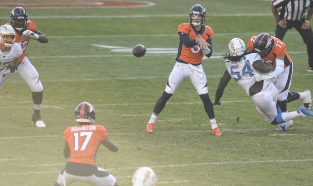 DENVER, CO - NOVEMBER 1: Drew Lock (3) of the Denver Broncos throws to DaeSean Hamilton (17) as Gar...