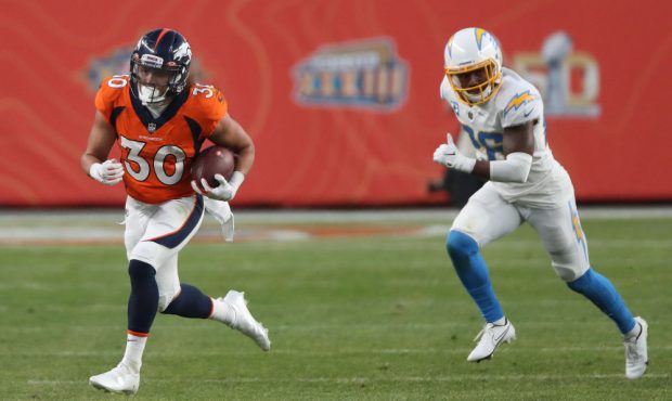 DENVER, COLORADO - NOVEMBER 01: Phillip Lindsay #30 of the Denver Broncos carries the ball against ...