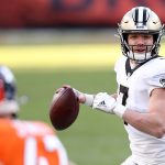 DENVER, COLORADO - NOVEMBER 29: Taysom Hill #7 of the New Orleans Saints looks to pass during the second quarter of a game against the Denver Broncos at Empower Field At Mile High on November 29, 2020 in Denver, Colorado. (Photo by Matthew Stockman/Getty Images)
