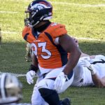 DENVER, CO - NOVEMBER 29: Taysom Hill (7) of the New Orleans Saints lies on the ground after being knocked down by Dre'Mont Jones (93) of the Denver Broncos during the first half on Sunday, November 29, 2020. (Photo by AAron Ontiveroz/MediaNews Group/The Denver Post via Getty Images)