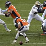 DENVER, CO - NOVEMBER 29: Phillip Lindsay (30) of the Denver Broncos fumbles the snap before Kwon Alexander (58) of the New Orleans Saints makes a recovery during the first half on Sunday, November 29, 2020. (Photo by AAron Ontiveroz/MediaNews Group/The Denver Post via Getty Images)