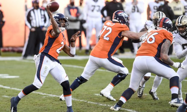 DENVER, CO - NOVEMBER 29: Kendall Hinton (2) of the Denver Broncos throws an incompletion against t...