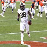 DENVER, COLORADO - NOVEMBER 29: Latavius Murray #28 of the New Orleans Saints rushes for a 36 yard touchdown during the third quarter of a game against the Denver Broncos at Empower Field At Mile High on November 29, 2020 in Denver, Colorado. (Photo by Matthew Stockman/Getty Images)