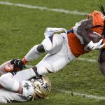 DENVER, CO - NOVEMBER 29: Alex Anzalone (47) of the New Orleans Saints stops Melvin Gordon III (25) of the Denver Broncos during the second half of New Orleans' 31-3 win on Sunday, November 29, 2020. (Photo by AAron Ontiveroz/MediaNews Group/The Denver Post via Getty Images)