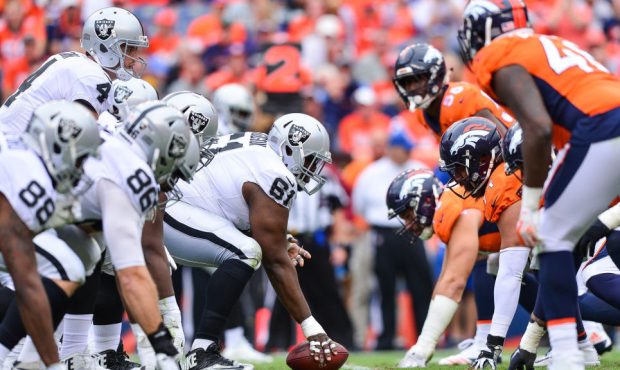 DENVER, CO - OCTOBER 1: The Oakland Raiders line up on offense behind Rodney Hudson #61 in the thir...