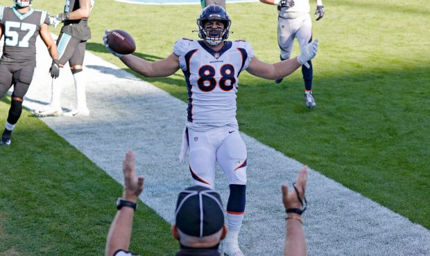 CHARLOTTE, NORTH CAROLINA - DECEMBER 13:  Nick Vannett #88 of the Denver Broncos celebrates his two...