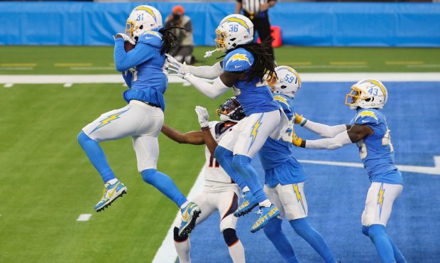 INGLEWOOD, CALIFORNIA - DECEMBER 27: Mike Williams #81 of the Los Angeles Chargers intercepts a pas...