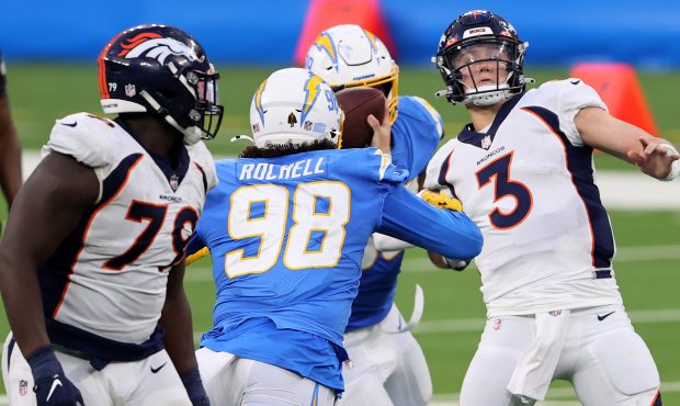INGLEWOOD, CALIFORNIA - DECEMBER 27: Isaac Rochell #98 of the Los Angeles Chargers pressures Drew L...