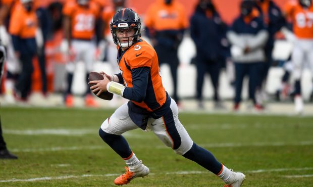 DENVER, CO - JANUARY 03: Denver Broncos quarterback Drew Lock (3) rolls out of the pocket during a ...