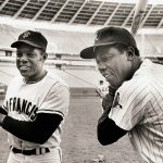 Home run sluggers Willie Mays (l) and Hank Aaron pose in uniform with bats. Mays and Aaron are two of the three major league players who have belted over 600 home runs. Willie Mays is at 660 while Hank Aaron is at 710, four shy of Babe Ruth's MLB record.