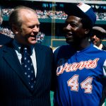 Hank Aaron of the Atlanta Braves is shown here with Vice President Gerald Ford and Johnny Bench in the foreground.