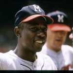 Outfielder Hank Aaron #44 of the Milwaukee Braves smiling before a  circa 1960's Major League Baseball game. Aaron played for the Braves from 1954-74. (Photo by Focus on Sport/Getty Images) *** Local Caption ***Hank Aaron