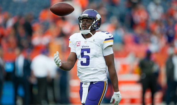 DENVER, CO - OCTOBER 4: Quarterback Teddy Bridgewater #5 of the Minnesota Vikings tosses the ball d...