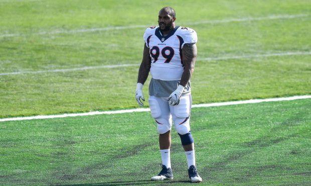 ENGLEWOOD, CO - AUGUST 20: Defensive tackle Jurrell Casey #99 of the Denver Broncos stands on the f...