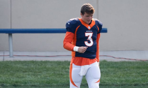 ENGLEWOOD, CO - AUGUST 21: Quarterback Drew Lock #3 of the Denver Broncos walks on the field during...