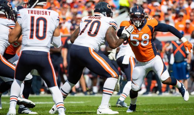 DENVER, CO - SEPTEMBER 15: Von Miller #58 of the Denver Broncos tries to rush past Bobby Massie #70...
