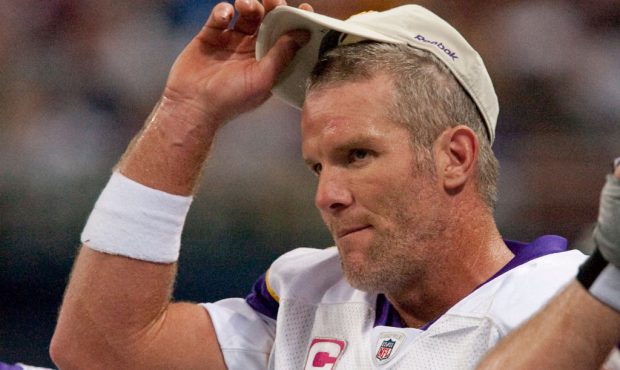 October 11, 2009: Vikings QB Brett Favre adjusts his cap on the sidelines against the Rams. The Min...