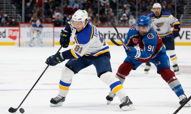 DENVER, CO - MAY 17:  Vladimir Tarasenko #91 of the St. Louis Blues controls the puck against Nazem...