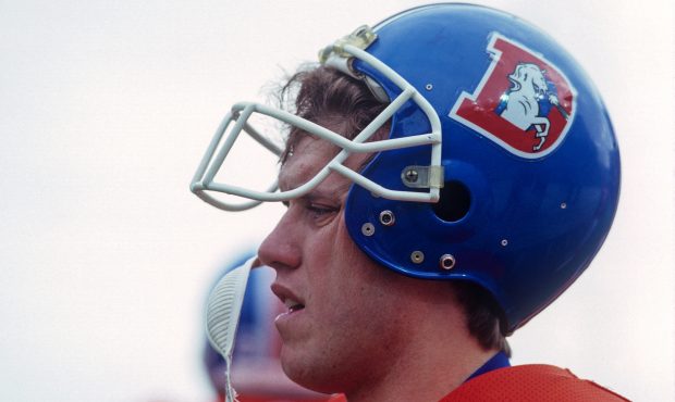 DENVER, CO - DECEMBER 19: Quarterback John Elway #7 of the Denver Broncos on the sideline during a ...