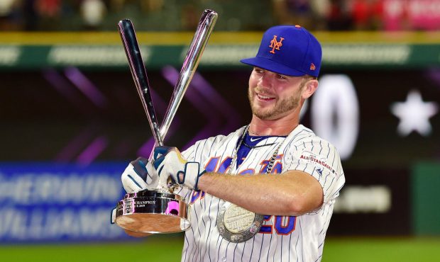 CLEVELAND, OHIO - JULY 08: Pete Alonso of the New York Mets poses with the trophy after winning the...