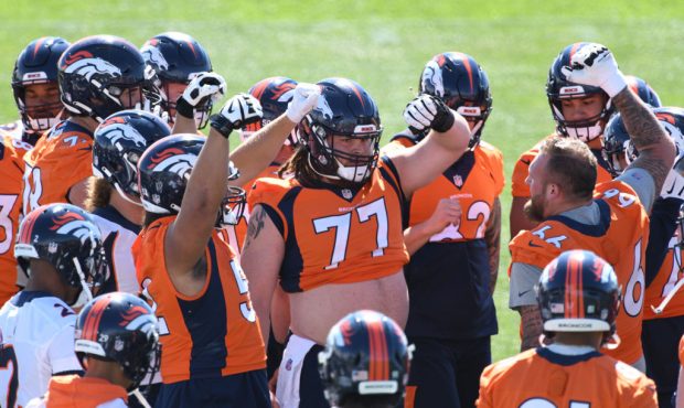 ENGLEWOOD, CO - JUNE 1 : Denver Broncos center Quinn Meinerz (77) and the teammates huddle for the ...