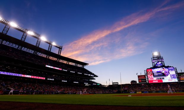 DENVER, CO - JULY 1: A general view as the sun sets over the stadium during the third inning of a g...