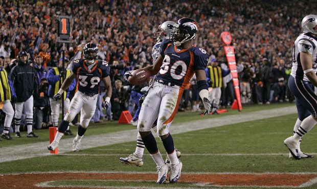 Wide receiver Rod Smith of the Denver Broncos scores a touchdown during the AFC Divisional Playoff ...