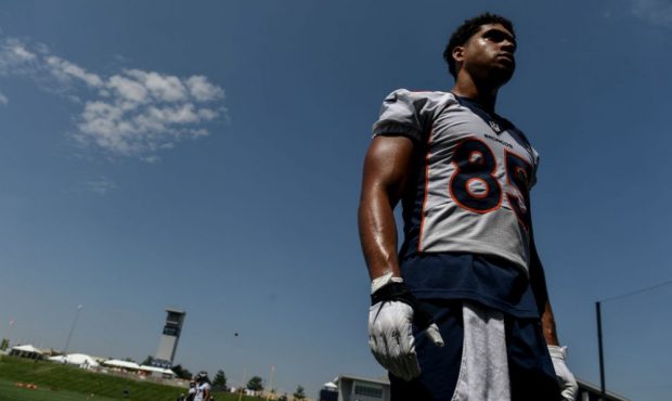 ENGLEWOOD, CO - JULY 29: Albert Okwuegbunam (85) of the Denver Broncos stands on the field after tr...