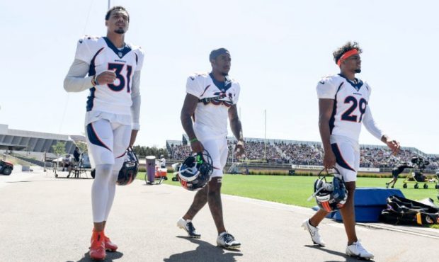 Justin Simmons (31), Ronald Darby (21) and Bryce Callahan (29) of the Denver Broncos take the field...