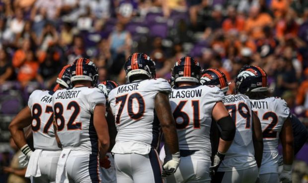 MINNEAPOLIS , MN - AUGUST 14: The Denver Broncos offense huddles as they play the Minnesota Vikings...