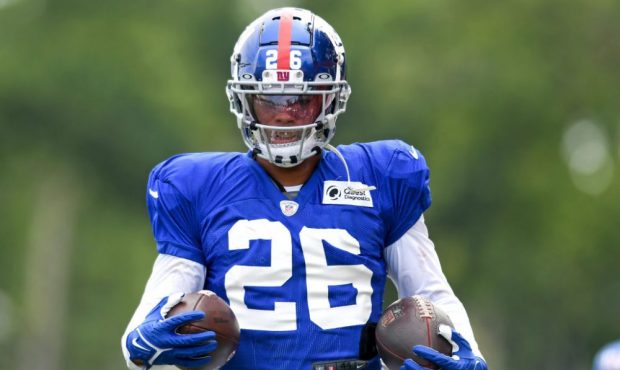 BEREA, OH - AUGUST 19: Running back Saquon Barkley #26 of the New York Giants runs a drill during a...