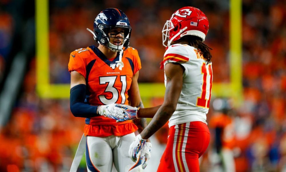 DENVER, CO - OCTOBER 17: Safety Justin Simmons #31 of the Denver Broncos chats with wide receiver D...