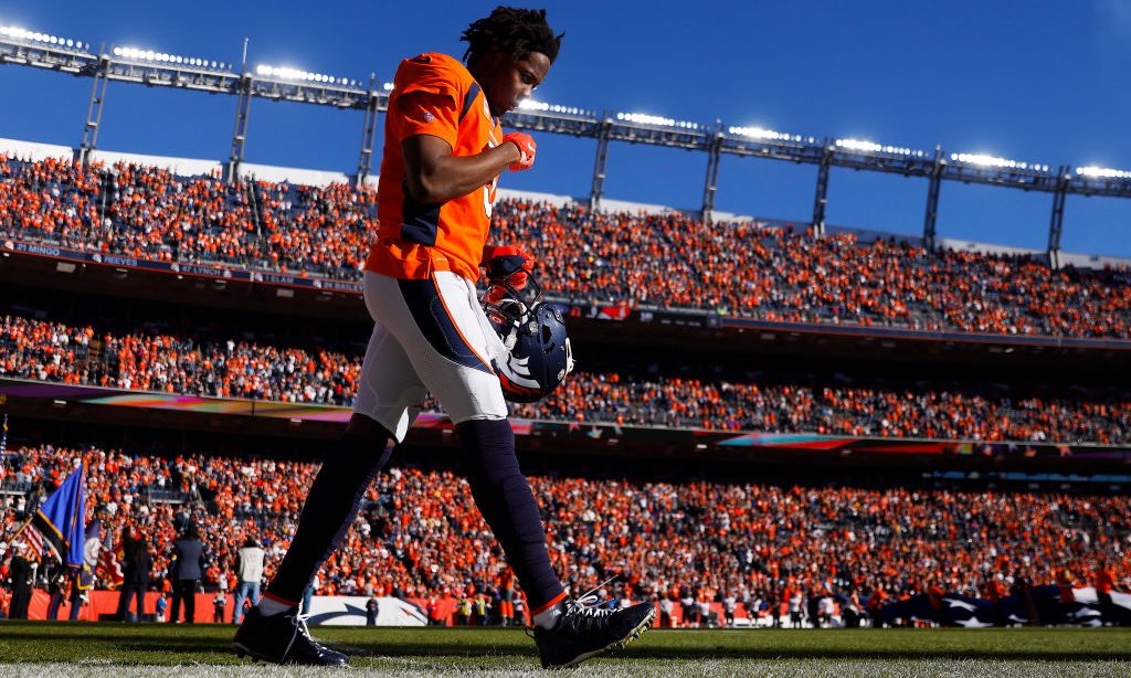 DENVER, COLORADO - DECEMBER 19: Teddy Bridgewater #5 of the Denver Broncos walks to the sideline af...