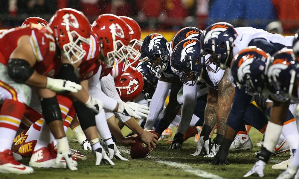 KANSAS CITY, MO - DECEMBER 25: The Chiefs and Broncos at the line of scrimmage during an AFC West s...