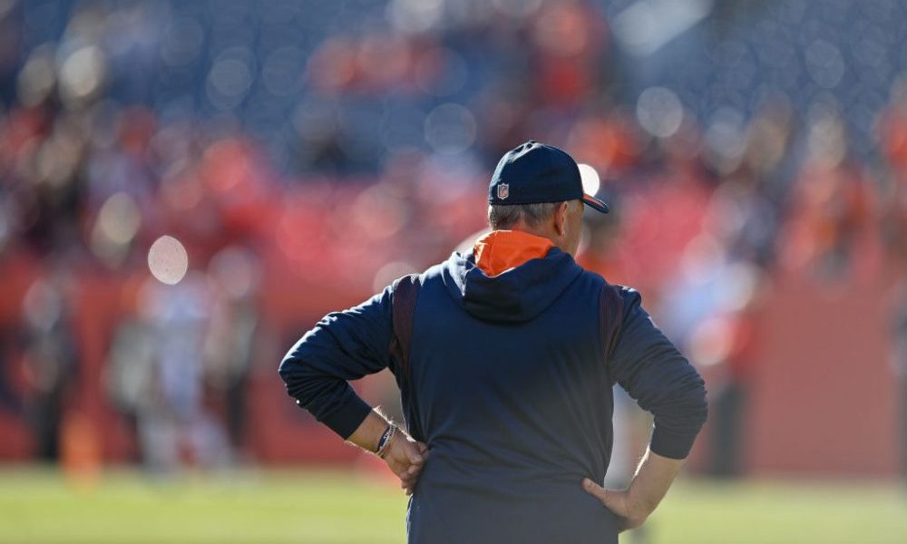 DENVER, CO - DECEMBER 19: Denver Broncos head coach Vic Fangio walks on the field before a game bet...