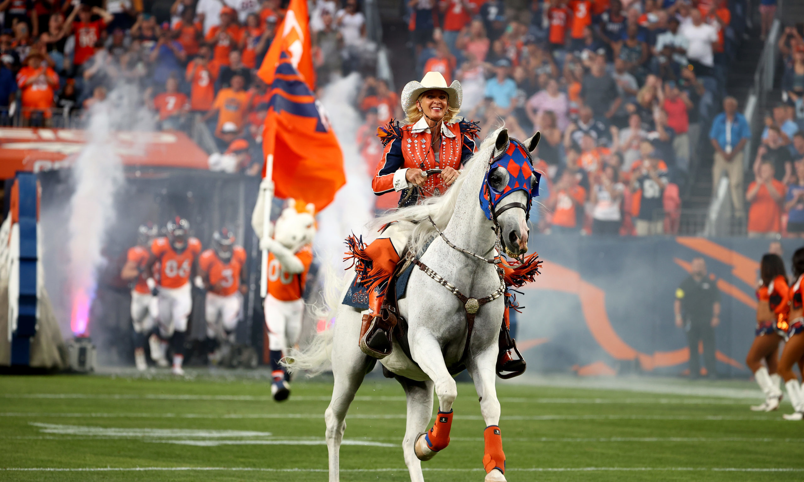 DENVER, CO - AUGUST 13: Thunder takes the field between the Denver Broncos and the Dallas Cowboys d...