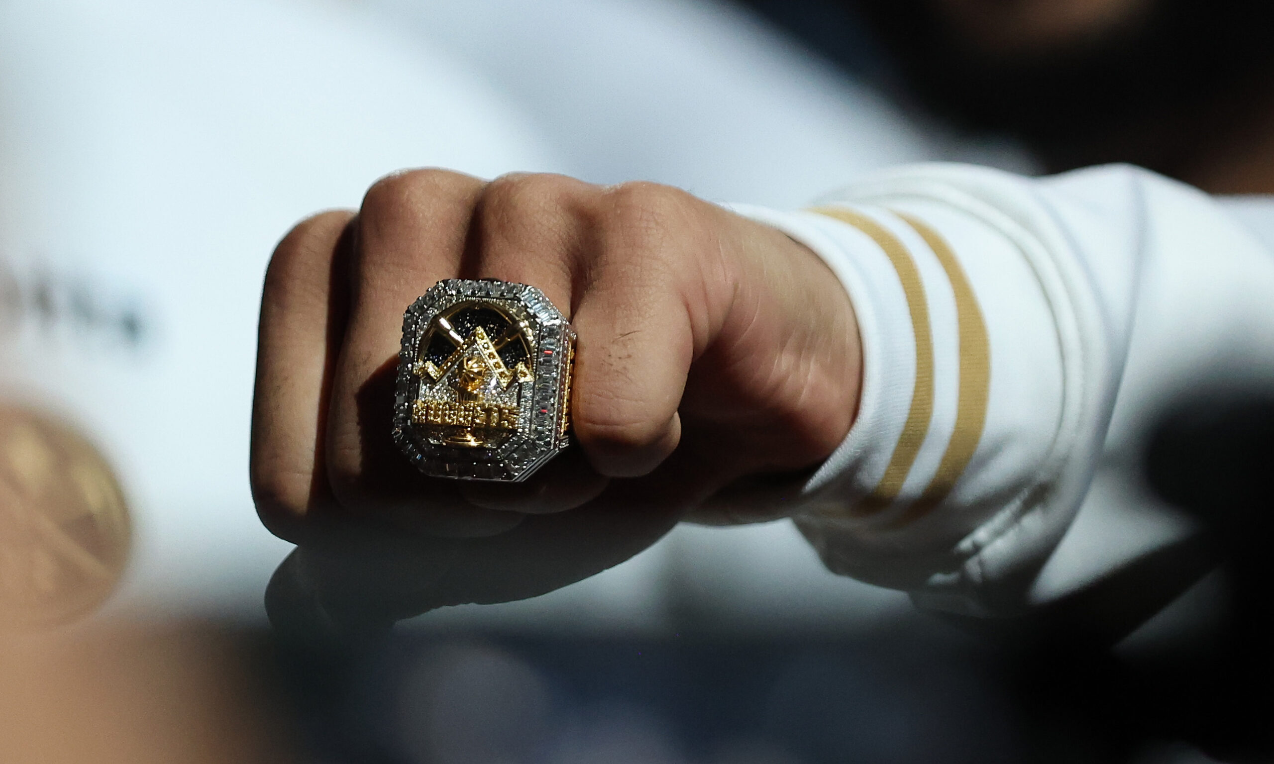 Jamal Murray #27 of the Denver Nuggets shows his championship ring...