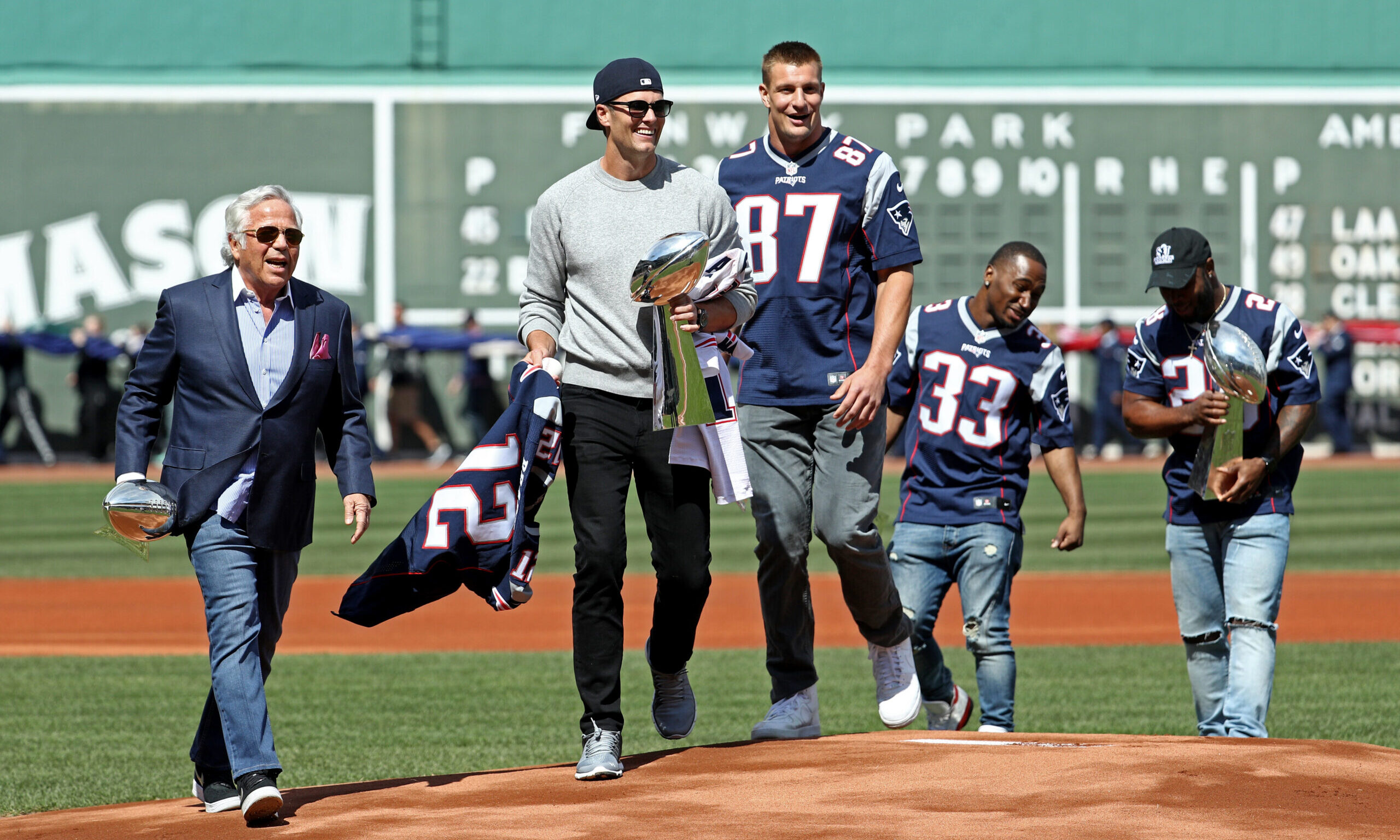 BOSTON, MA - APRIL 3: From left, New England Patriots owner Robert Kraft, Tom Brady #12, Rob Gronko...