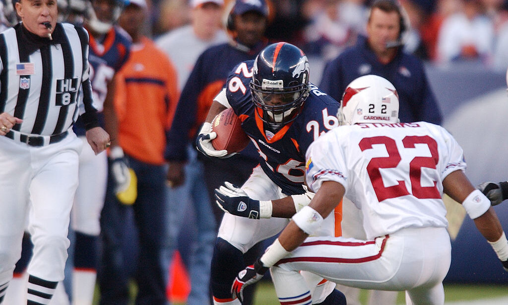 Denver Broncos running back Clinton Portis gains yards against the Arizona Cardinals...