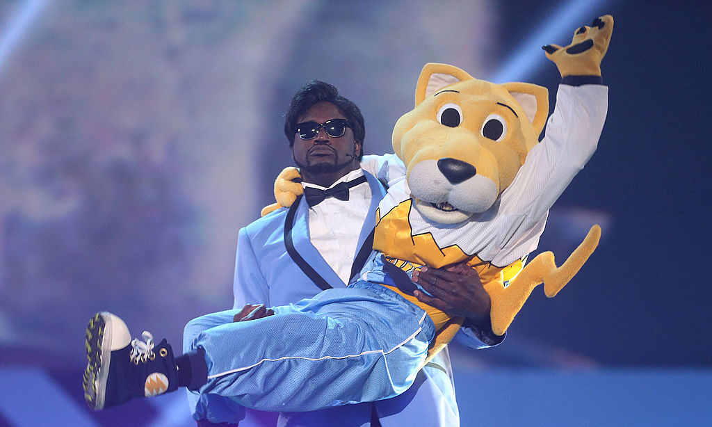 Shaquille O' Neal (L) and Rocky, the Mascot of the Denver Nuggets...