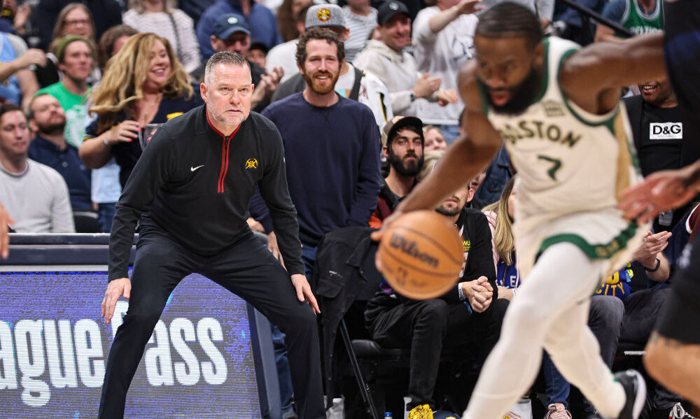 Head coach Michael Malone of the Denver Nuggets looks on during the game against the Boston Celtics...