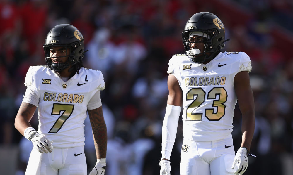 Cam'Ron Silmon-Craig #7 and Carter Stoutmire #23 of the Colorado Buffaloes during the NCAAF game at...