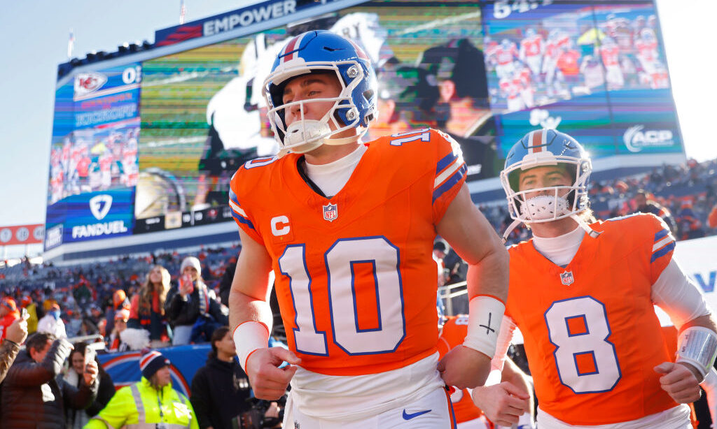 Bo Nix #10 of the Denver Broncos takes the field before the game against the Kansas City Chiefs at ...