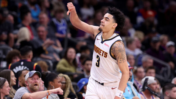 Julian Strawther #3 of the Denver Nuggets gestures after hitting a three point shot during the second half against the Phoenix Suns at Footprint Center on February 08