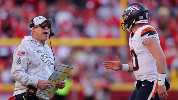 KANSAS CITY, MISSOURI - NOVEMBER 10: Head coach Sean Payton of the Denver Broncos talks to Bo Nix #10 during the fourth quarter against the Kansas City Chiefs at GEHA Field at Arrowhead Stadium on November 10, 2024 in Kansas City, Missouri.
